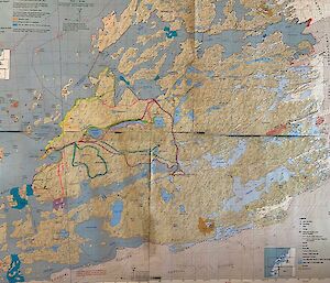 A map of the Vestfold Hills including Davis station with several trips drawn onto it with different coloured textas.