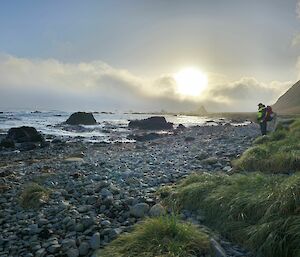 Aaron looking over the relatively clean beach at Sandell Bay at the end of a day of marine debris collection