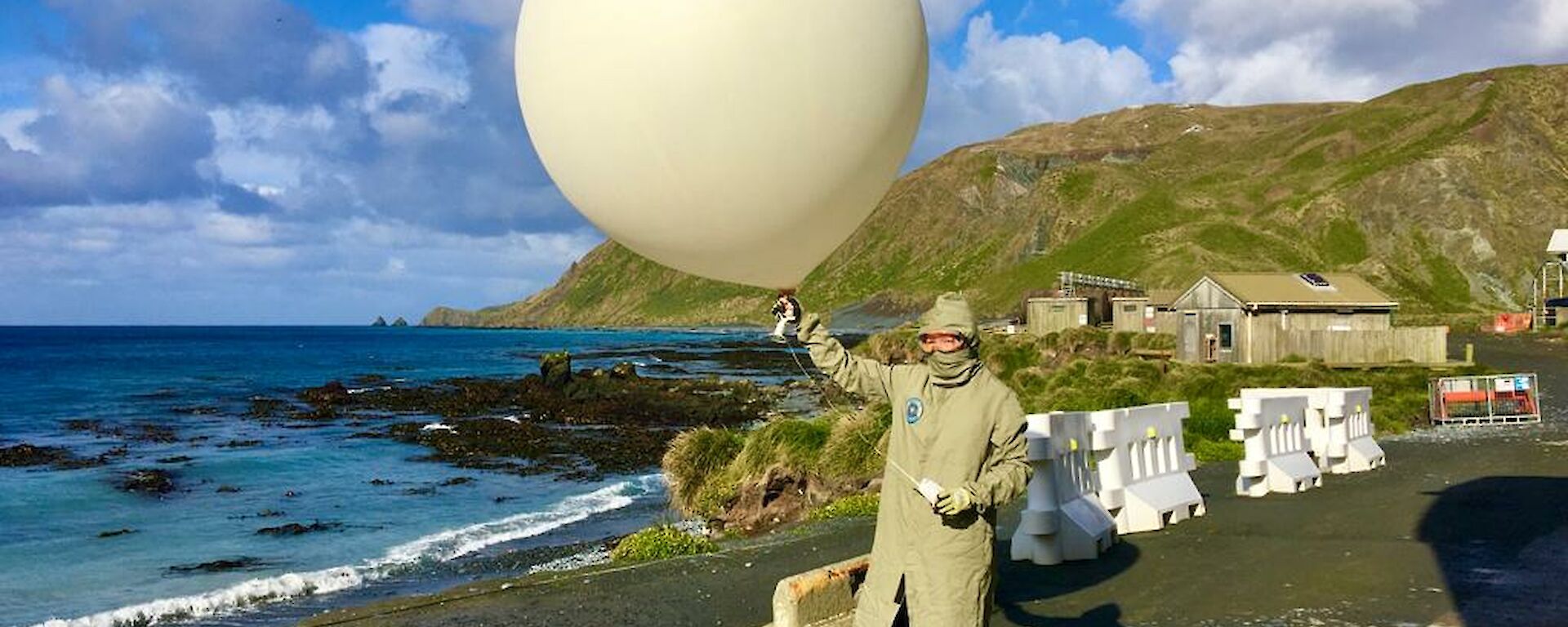 Rachel releases a balloon with a sonde attached to measure the atmospheric conditions.