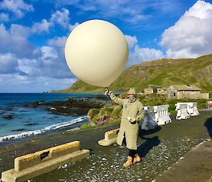 Rachel releases a balloon with a sonde attached to measure the atmospheric conditions.