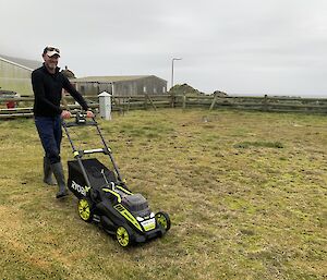 Damien tends to the Met Office enclosure lawn.