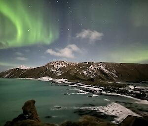 Macca station moonlit with an aurora.