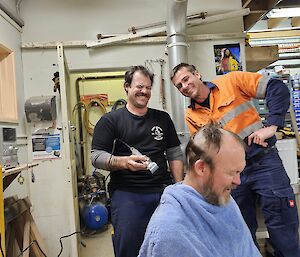 Sharp Cuts Barber Adam McLaughlin in action.