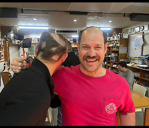 Macca winter expeditioners Damien & Adam showing their sharp haircuts.