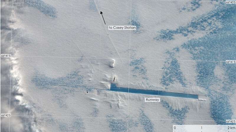Satellite view showing straight blue line in an ice landscape
