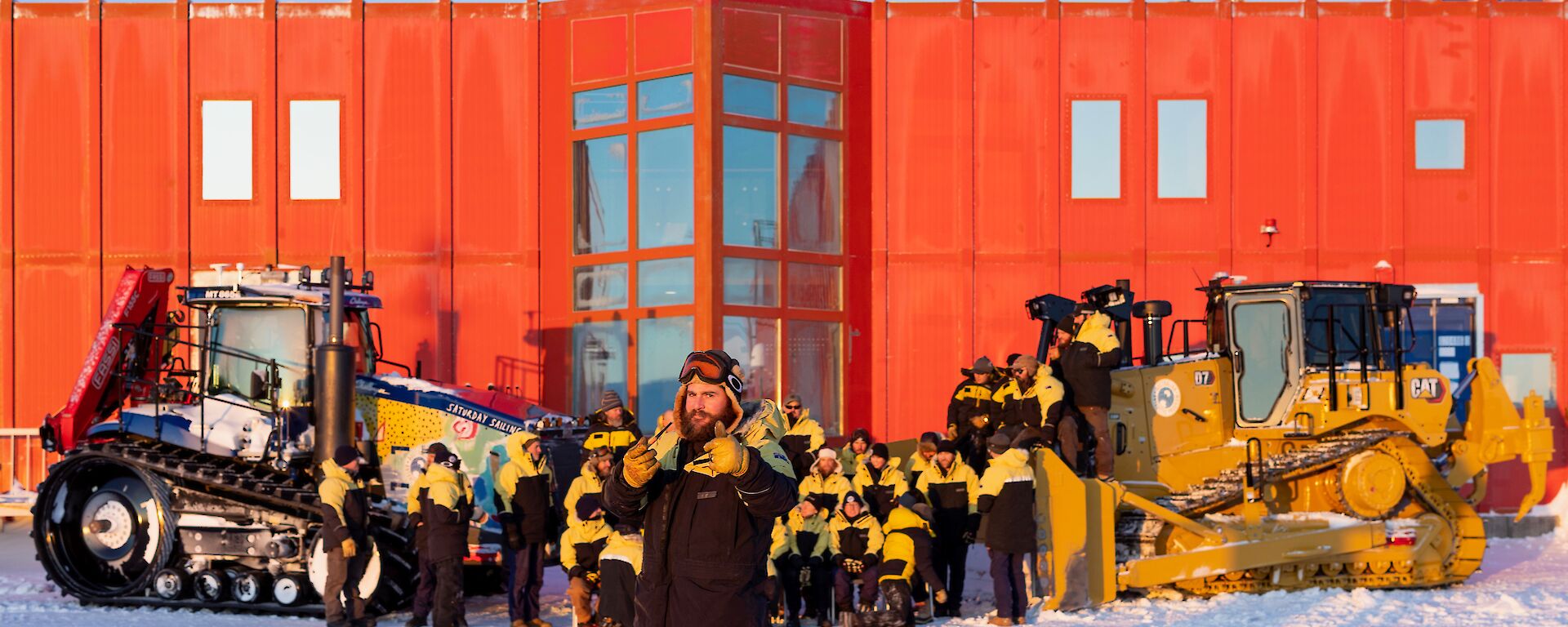 A single expeditioner stands out in front of the rest of the group