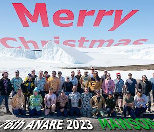 76th ANARE Christmas card with everyone in front of the Icebergs.