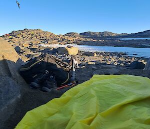 Overnight camping under the stars with yellow Bivvy bag set up