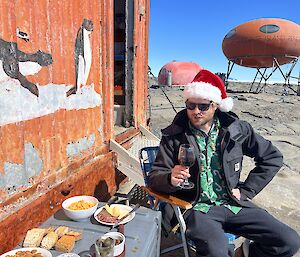 Ben having christmas lunch outside in the sun