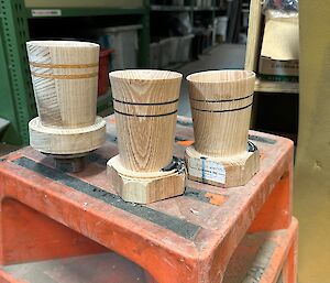 3 timber crafted cups