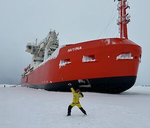 Jamie in front of the Nuyina in Seaice