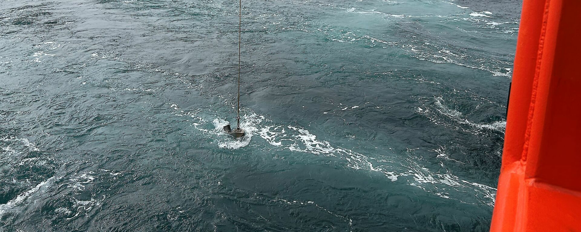 Continuous Plankton Recorder being winched out of the ocean