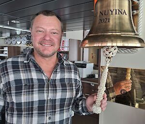 Nuyina, Pete Hargreaves and Nuyina's bell on the bridge