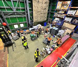 Looking down inside a warehouse filed with boxes