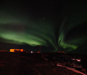 An aurora above the Aeronomy building, Mawson station recently