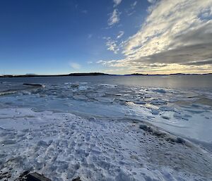 Looking along an ice covered coastline at Mawson