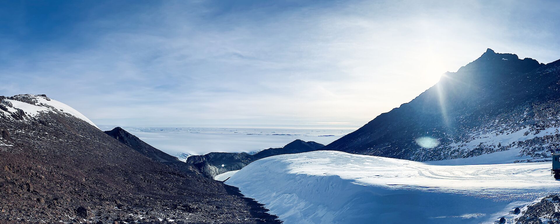 A typical rocky vista in the Framnes Mountains with Hagglunds in the foreground