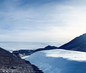 A typical rocky vista in the Framnes Mountains with Hagglunds in the foreground