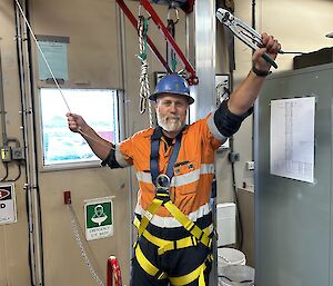 John Sommers in his high-vis work gear and ppe ready for a trip down into the cosray vault