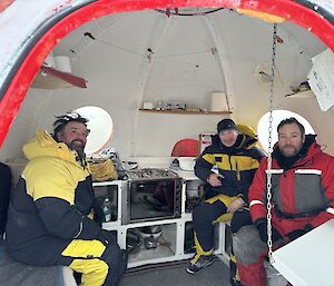 Three expeditioners at Rookery Lake