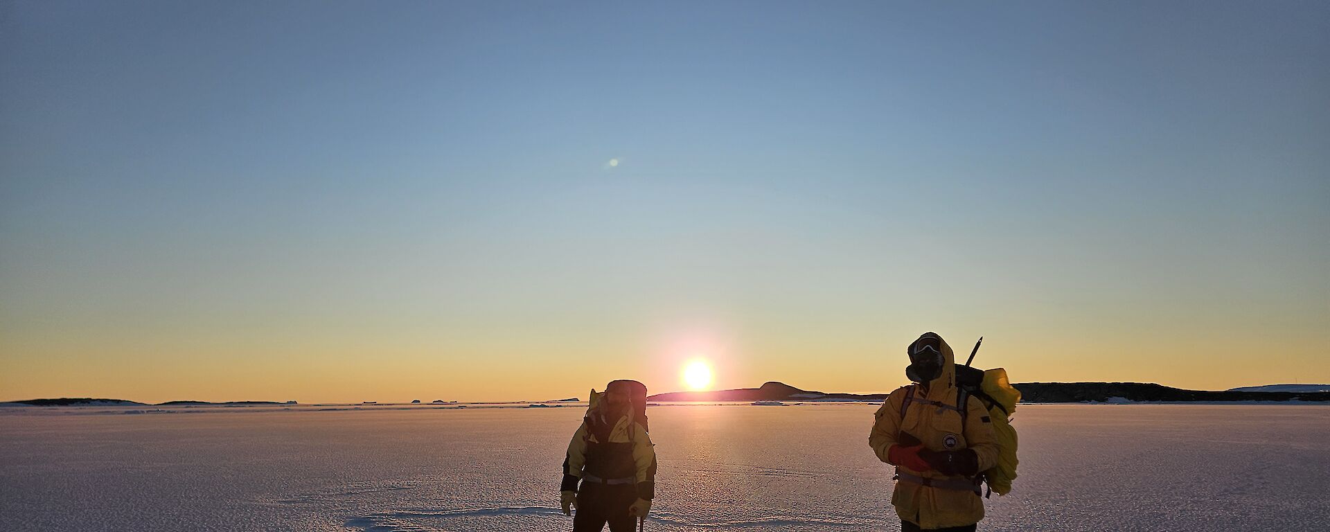 Two expeditioners out to test the thickness of the sea ice near Mawson station recently