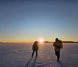 Two expeditioners out to test the thickness of the sea ice near Mawson station recently