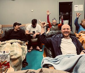 Expeditioners rugged up and relaxed in the Odeon theater for a Star Wars marathon.