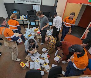 Expeditioners collecting packages sent from friends and family back home