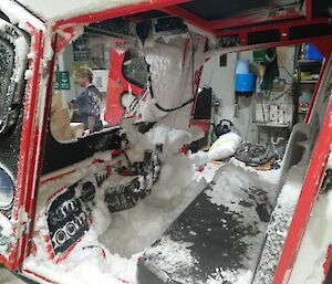 The front cab of a vehicle full of snow after Monday's blizzard
