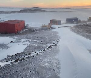 Snow still in the air as the winds settle and we see our new bliz tail from the Red shed to the workshops this week at Mawson station