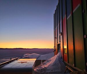 Looking out at the winter colours of sunset from the workshops at Mawson station recently