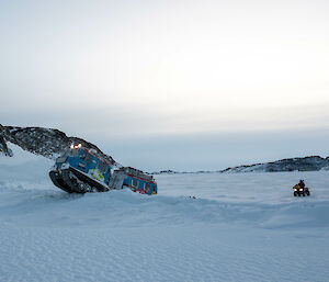 Hägglunds vehicle crossing a tide crack
