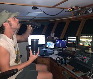 mitch on the bridge of a trawler boat