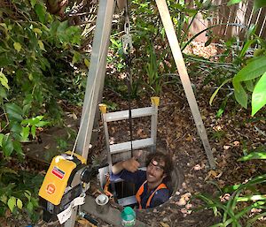 mitch working in a storm water well
