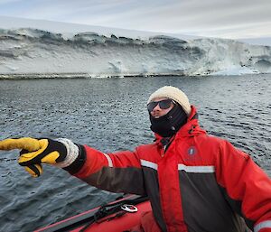 Coxswain stu aboard small inflatable water craft