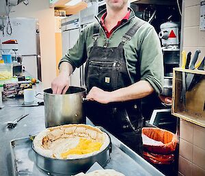 Mick Mercer baking in the kitchen and attempting to perfect his mums pavlova recipe