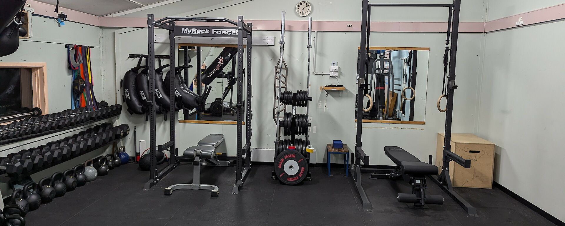 After photo of station gymnasium, showing organised weights and more open floor space