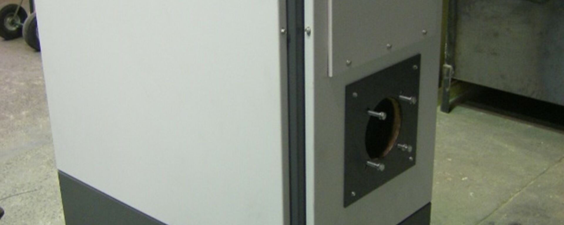 Kroll heating machine which is a vertical airconditioning type heat exchanger that runs of waste oils is pictured prior to original installation from earlier days looking new and capable