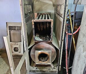 The kroll machine pictured fully taken apart as maintenance is under way
