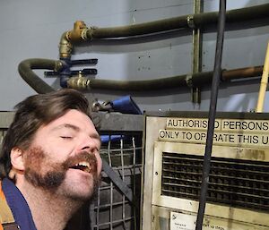 Traverse Diesel mechanic cheekily enjoys the warm breeze of the kroll of his face as it is returned to service