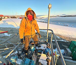 Plumber John Grimson at the Mawson lower fuel farm installing a reconditioned fuel transfer pump