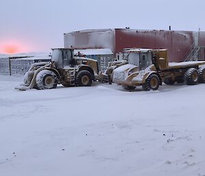 Bulldozer and other plant equipment in the snow