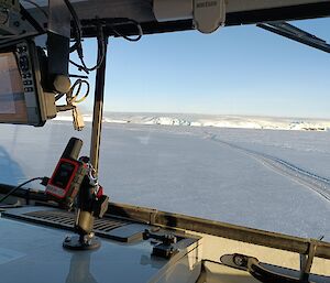 A view through a Hagglunds window of the sea-ice with a re-frozen lead clearly visible