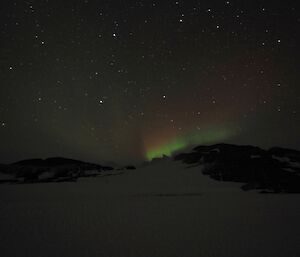 A small by colourful aurora over the Macey hut area