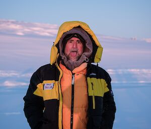 Dave station leader has his photo taken while pulling a funny cheeky face during the mid-winter swim event