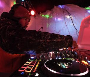 Mitch the local DJ seen working the musical decks in a hand made out-door ice bar