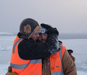 Two expeditioners sharing brother like love in the outside during work