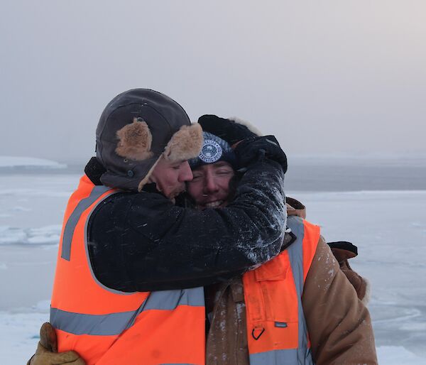 Two expeditioners sharing brother like love in the outside during work