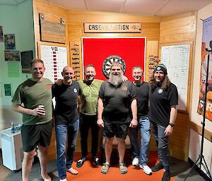 6 expeditioners after winning the inter-station darts competition