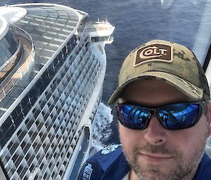 A self captured image of James aboard a very large cruise ship